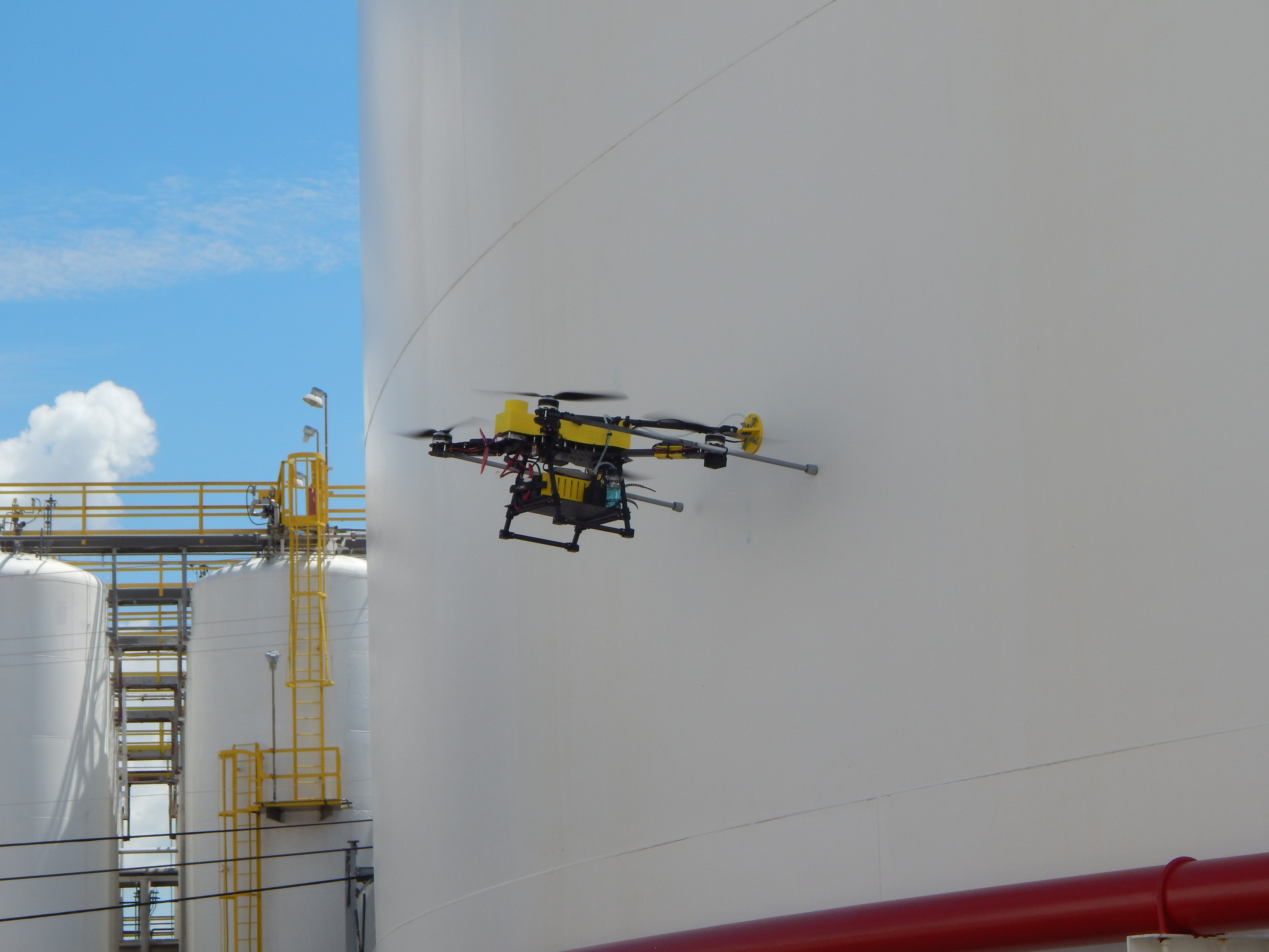 Apellix NDT drone inspecting storage tank